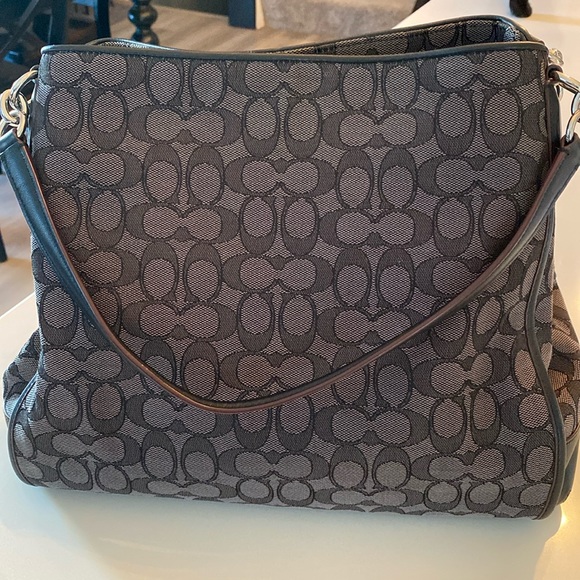 Like new Authentic Coach purse. Grey tones w/ black...